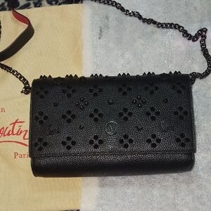 Christian Louboutin Red and Black Clutch with Perforated Design